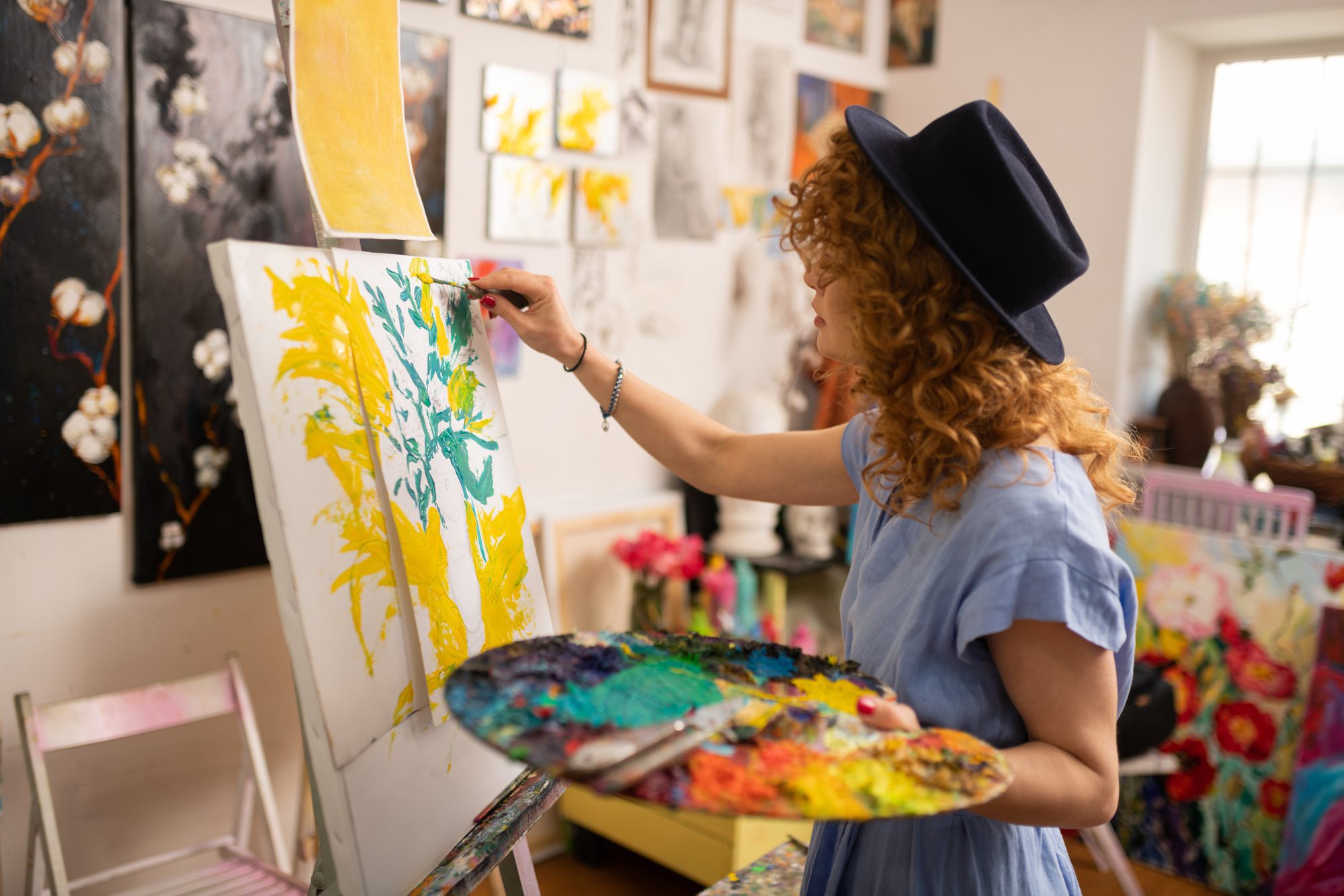 A woman doing some Art therapy to help her depression symptoms