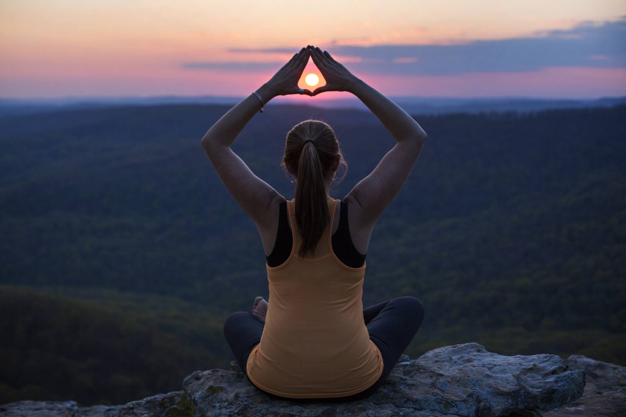 Woman doing a yoga pose after a mindfulness retreat