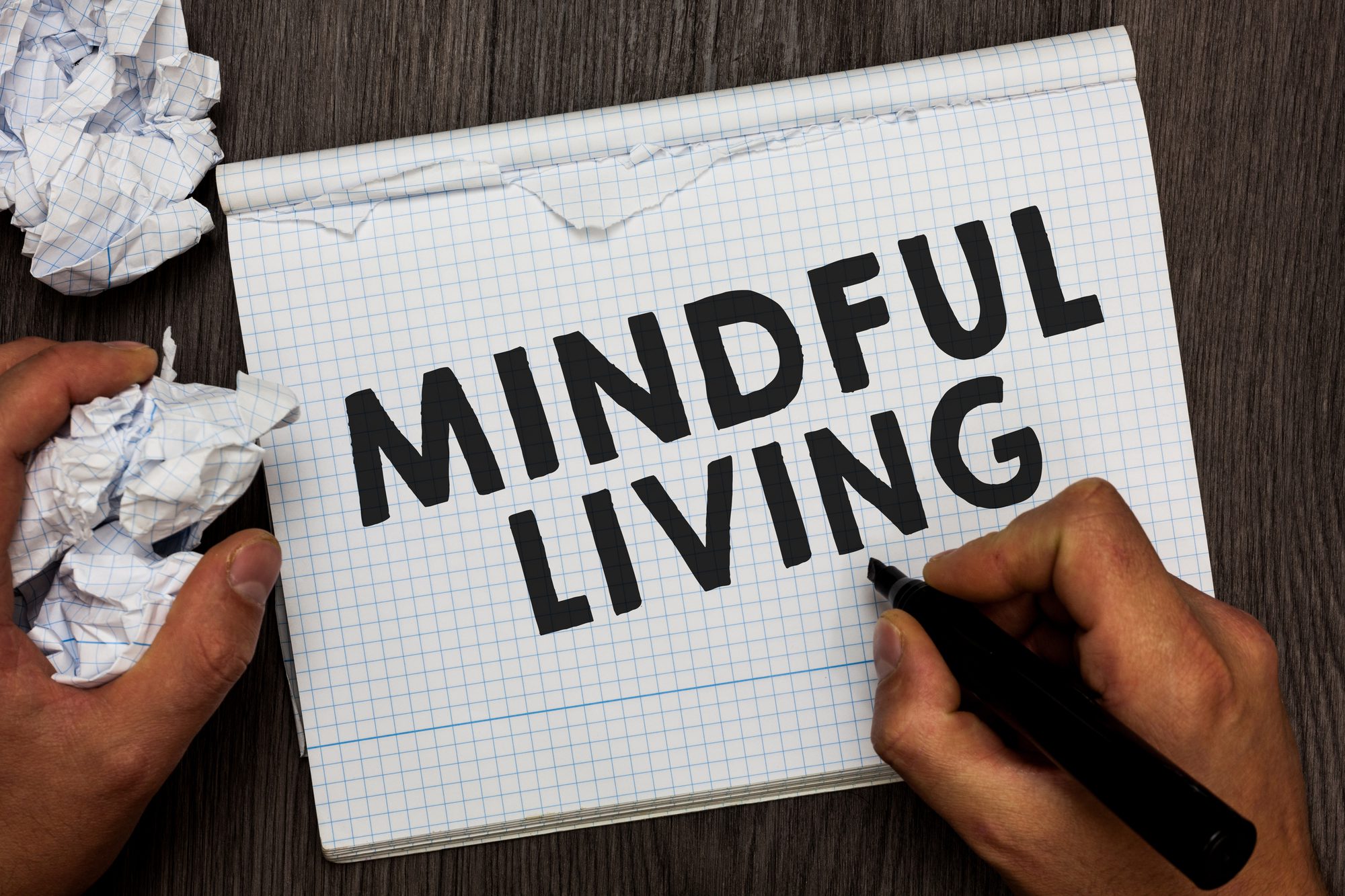 Writing note showing Mindful Living. Business photo showcasing Fully aware and engaged on something Conscious and Sensible Man holding marker notebook crumpled papers several tries made